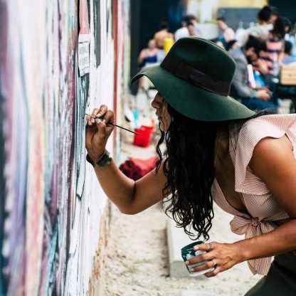 girl paiting on the wall