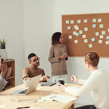 group of people talking and planning